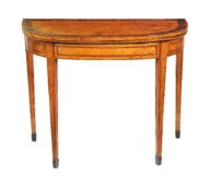 ϒ A George III satinwood, mahogany and rosewood banded card table
