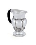 Georg Jensen, a Danish silver water jug or pitcher