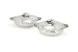Georg Jensen, a pair of Danish silver Blossom pattern circular vegetable dishes
