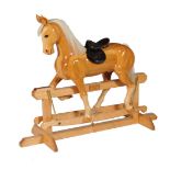 Henry Maas, a handcrafted light oak trestle rocking horse