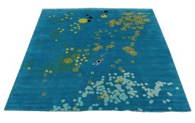 Poppy Bomb, a Nepalese rectangular woollen carpet by Sky Lake Carpet & Handicrafts