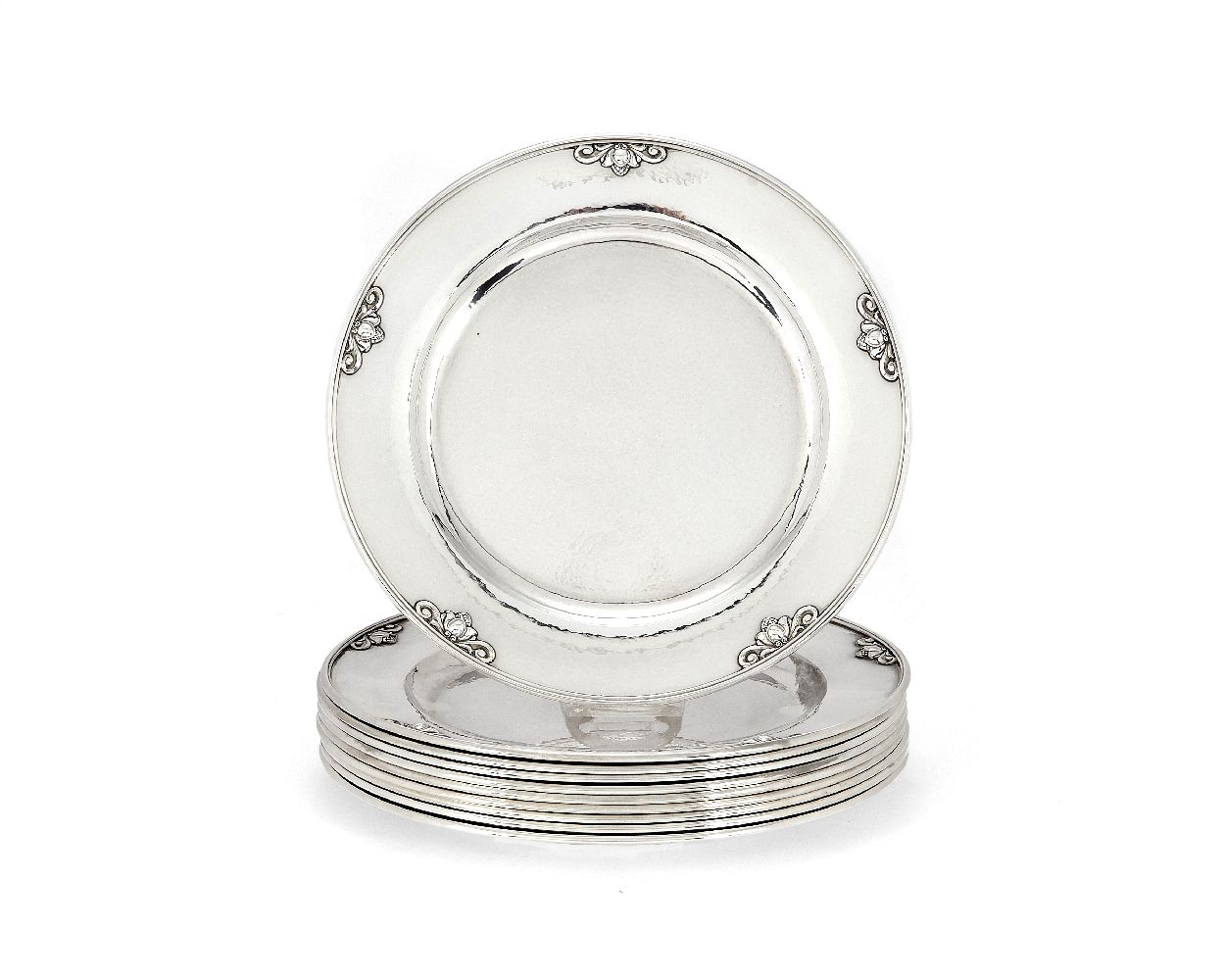 Georg Jensen, a set of ten Danish silver Acorn pattern dinner plates