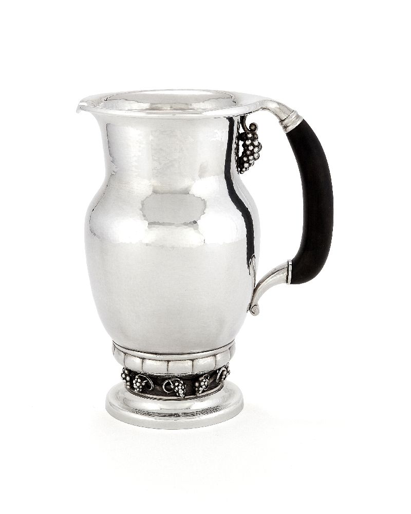 Georg Jensen, a Danish silver Grape pattern pitcher or jug