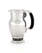 Georg Jensen, a Danish silver Grape pattern pitcher or jug