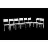 Twenty four wooden dining or kitchen chairs