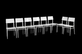 Twenty four wooden dining or kitchen chairs