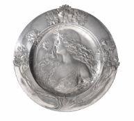 WMF, a Jugendstil silver plated pewter shaped circular wall plaque by WMF