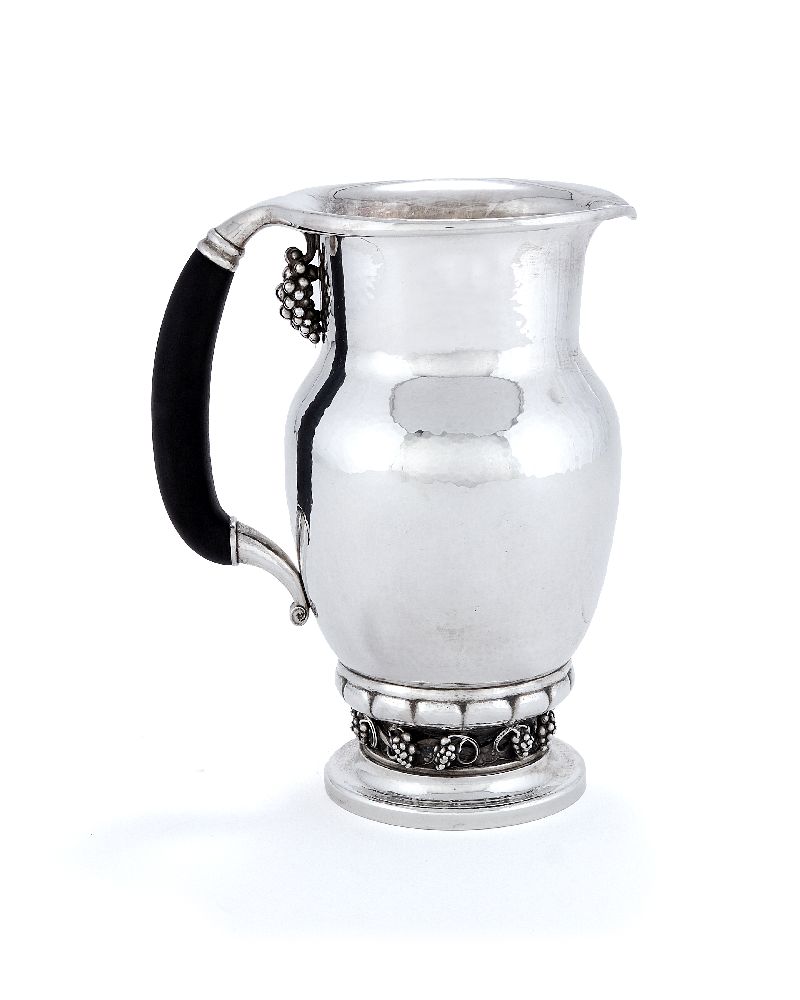 Georg Jensen, a Danish silver Grape pattern pitcher or jug