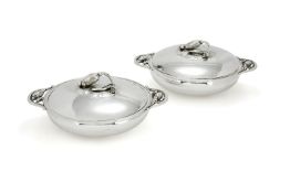 Georg Jensen, a pair of Danish silver Blossom pattern circular vegetable dishes