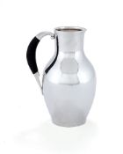 Georg Jensen, a Danish silver water jug or pitcher