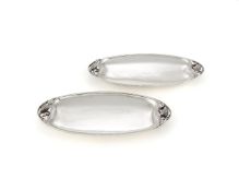 Georg Jensen, a pair of Danish silver Blossom pattern trays