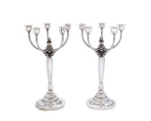 Georg Jensen, a pair of Danish silver five-light candelabra