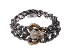 Stephen Webster, a diamond accented ram's skull bracelet