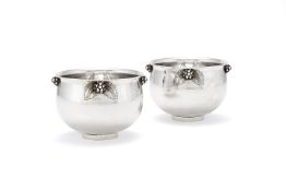 Georg Jensen, a pair of Danish silver Grape pattern bowls