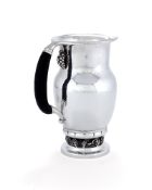 Georg Jensen, a Danish silver Grape pattern pitcher or jug
