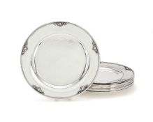 Georg Jensen, a set of ten Danish silver Acorn pattern dinner plates