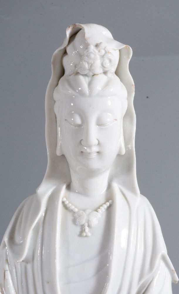 A Chinese Dehua figure of Guanyin and child - Image 2 of 4