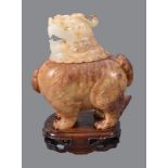 A Chinese brown and white jade Luduan-form censer