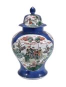 A Chinese Famille-Verte powder-blue ground vase