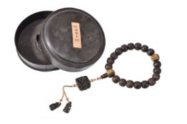 A string of Chinese wood rosary beads