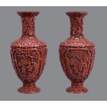 A pair of Chinese carved cinnabar lacquer baluster vases