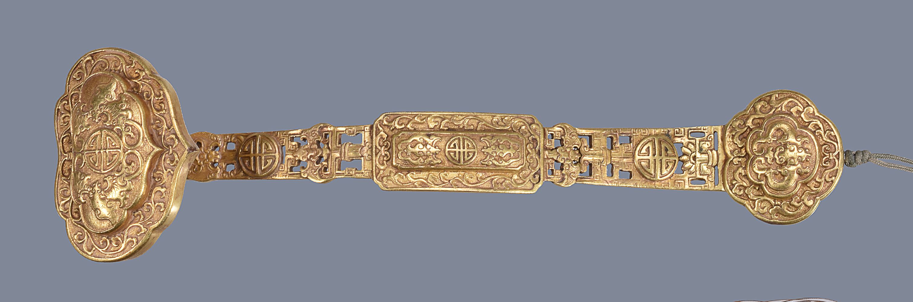 A Chinese gilt bronze ruyi sceptre - Image 2 of 6