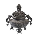 A Chinese bronze censer and cover