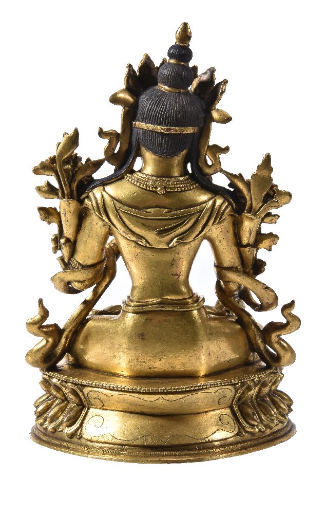A Sino-Tibetan gilt-bronze figure of Tara - Image 4 of 5
