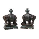 A pair of Chinese bronze Cloisonn&#233; and Champlev&#233; enamel elephants