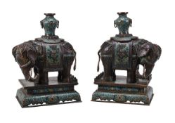 A pair of Chinese bronze Cloisonn&#233; and Champlev&#233; enamel elephants