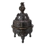 A large Chinese bronze incense-burner and cover