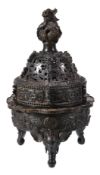 A large Chinese bronze incense-burner and cover