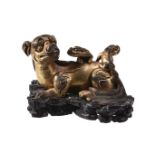 A Chinese gilt-bronze 'lion' scroll weight