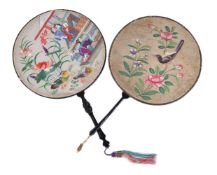ϒ A Chinese embroidered circular 'Pien Mien' hand screen and a Chinese painted circular hand screen