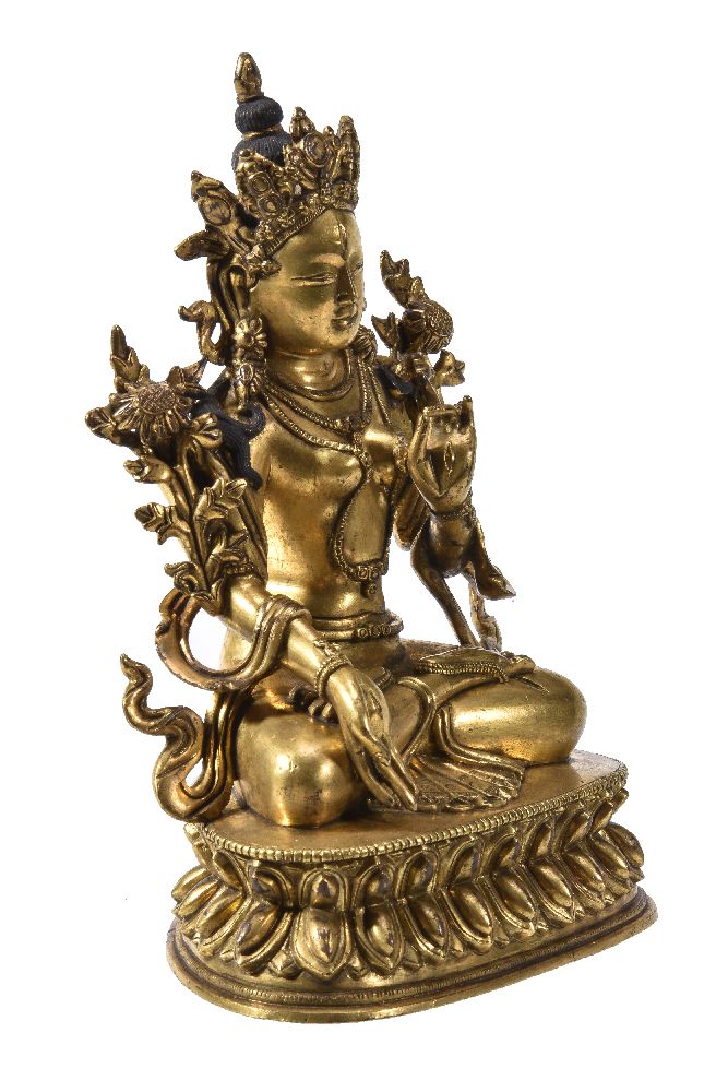 A Sino-Tibetan gilt-bronze figure of Tara - Image 2 of 5