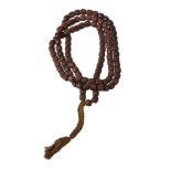 A Chinese wood bead necklace