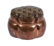 A Chinese lobed bronze hand warmer and cover