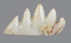 A Chinese celadon jade brush rest