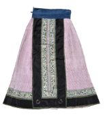 A Chinese woman's pink silk damask pleated skirt