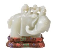A Chinese white jade 'elephant and riders' group