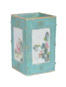 A small Chinese Famille Rose turquoise-ground brush pot