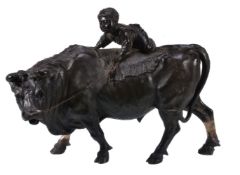 Genryusai Seiya: A Large Japanese Bronze Group of an oxherd on top of a large bovine