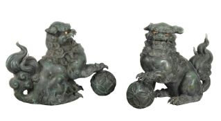 A Large Pair of Cast Bronze Shishi