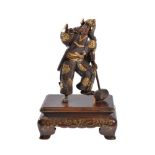 Miya-o Eisuke: A Parcel Gilt Bronze Figure of a Samurai