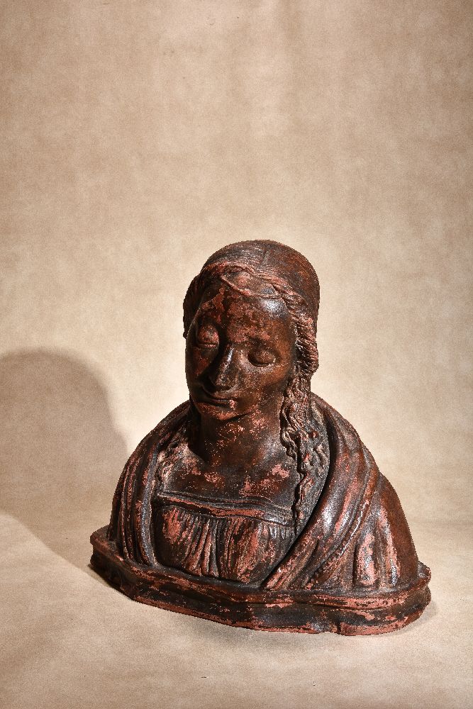 A painted terracotta bust of a maiden