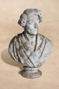 A sculpted white marble portrait bust of a gentleman