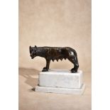 An Italian patinated bronze model of the Roman she-wolf