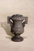 A Victorian carved Peterhead granite twin handled urn