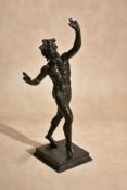 An Italian patinated bronze model of the Pompeiian Dancing Faun