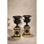 A pair of Italian patinated bronze and marmo Siena mounted models of Campana urns